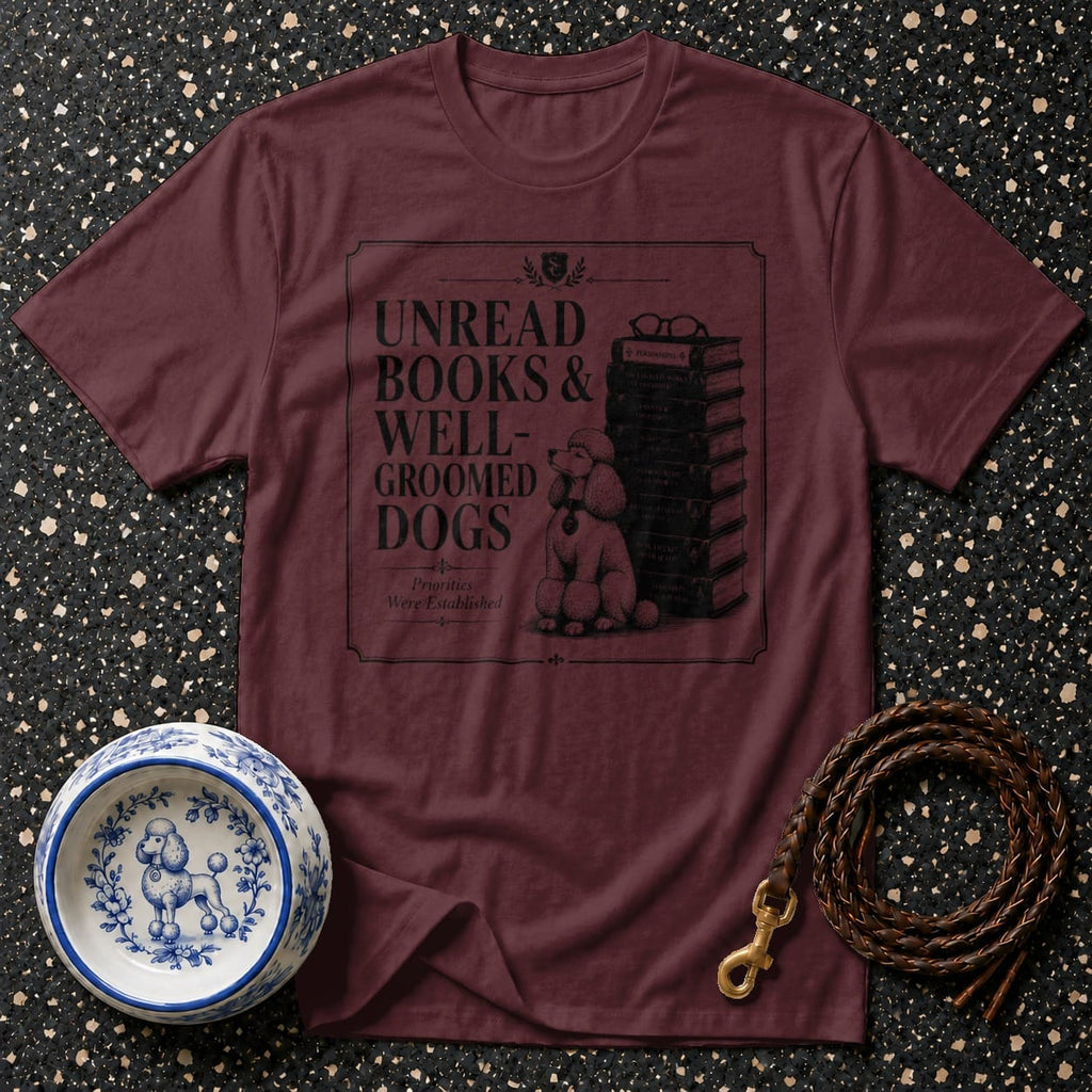 Maroon t-shirt with text "Unread Books & Well-Groomed Dogs".
