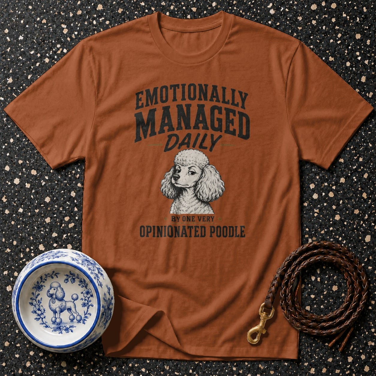 Brown t-shirt with "Emotionally Managed Daily by One Very Opinionated Poodle" and poodle graphic.