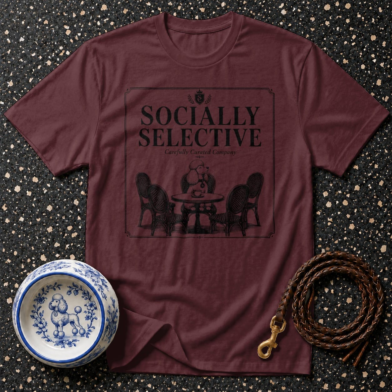 Maroon t-shirt with "Socially Selective" text and illustration of dogs at a table.
