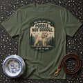Green t-shirt with distressed emblem: "Poodle. Not Doodle. It's Not The Same."