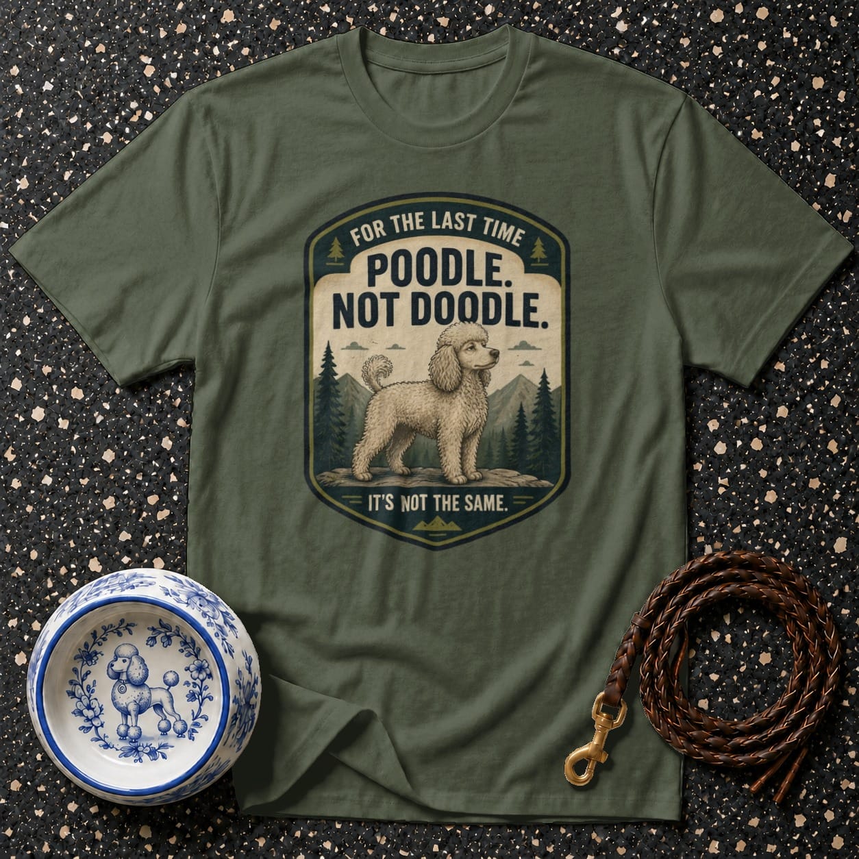 Green t-shirt with distressed emblem: "Poodle. Not Doodle. It's Not The Same."