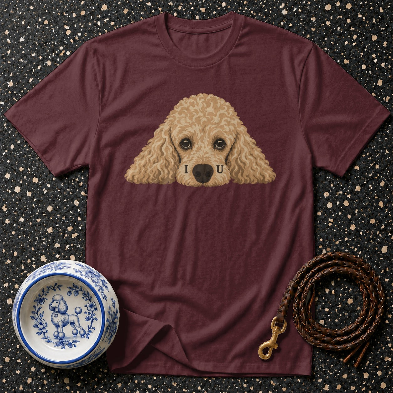 Maroon t-shirt with poodle graphic and "I U" text, plus dog bowl and leash.