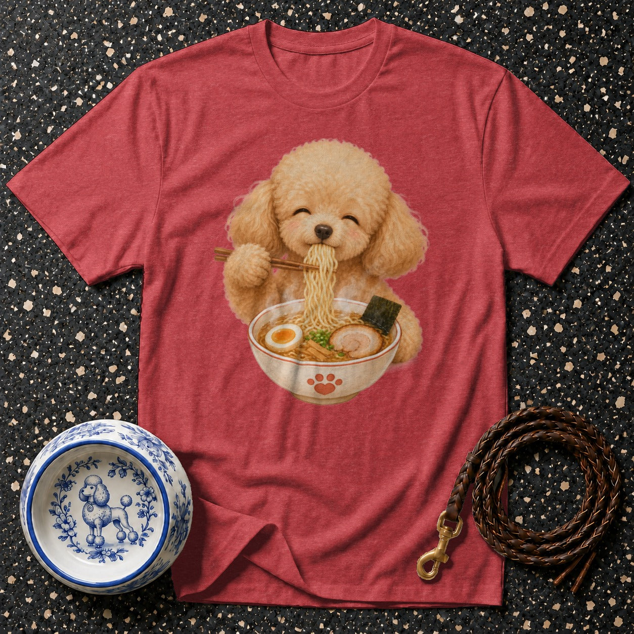 Red t-shirt with a poodle eating ramen noodles graphic.