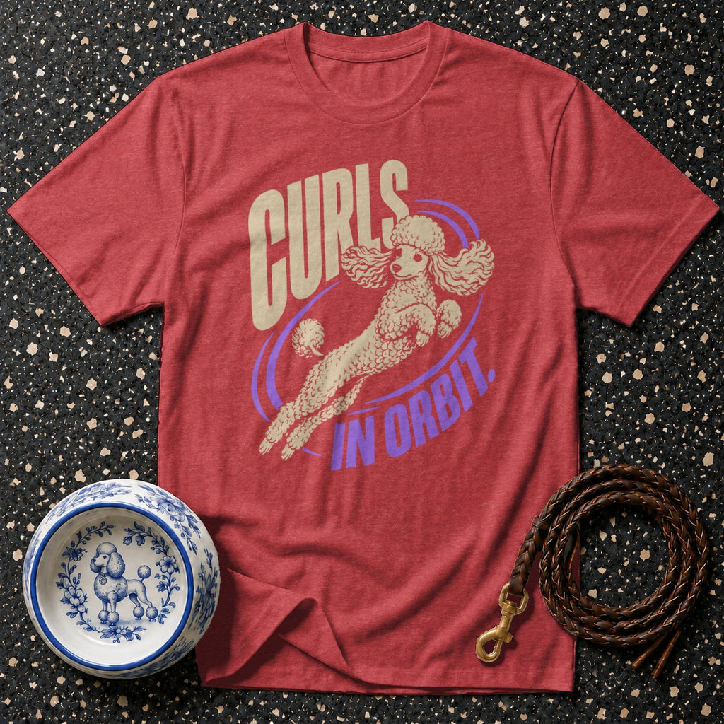 Red t-shirt with poodle graphic and text "Curls in Orbit".