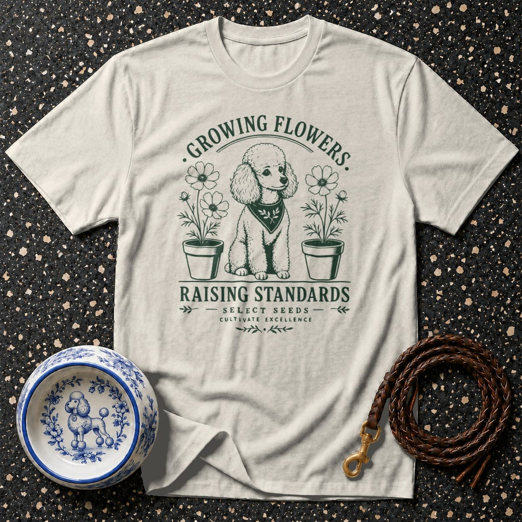 T-shirt with poodle illustration, "Growing Flowers. Raising Standards." text, and dog accessories.
