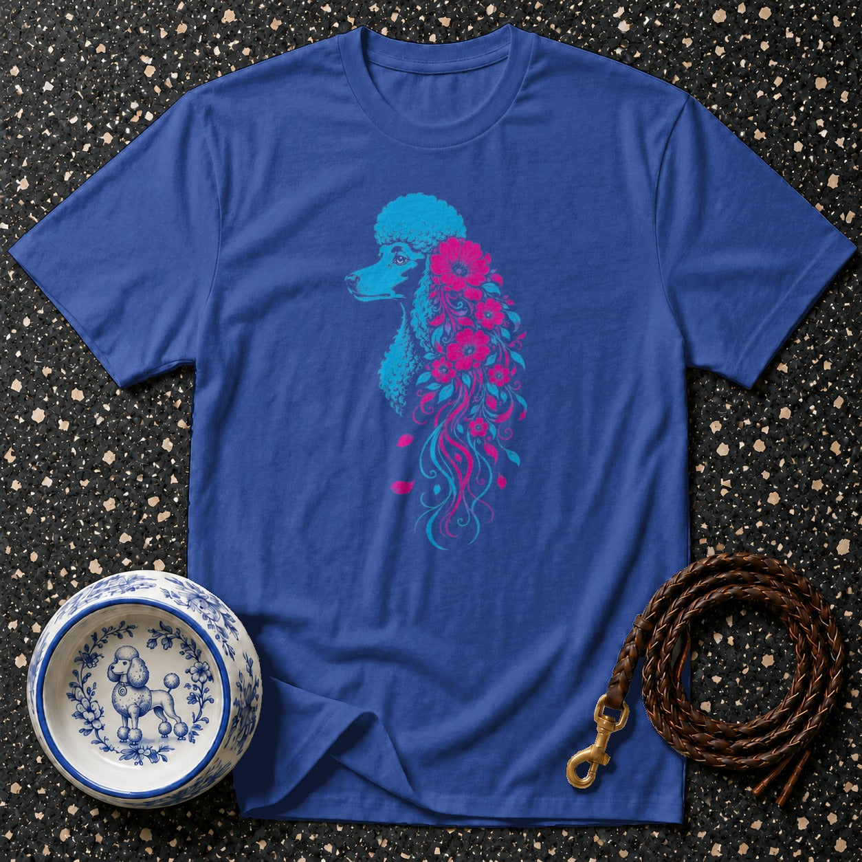 Royal blue t-shirt with a stylized poodle graphic in blue and pink.
