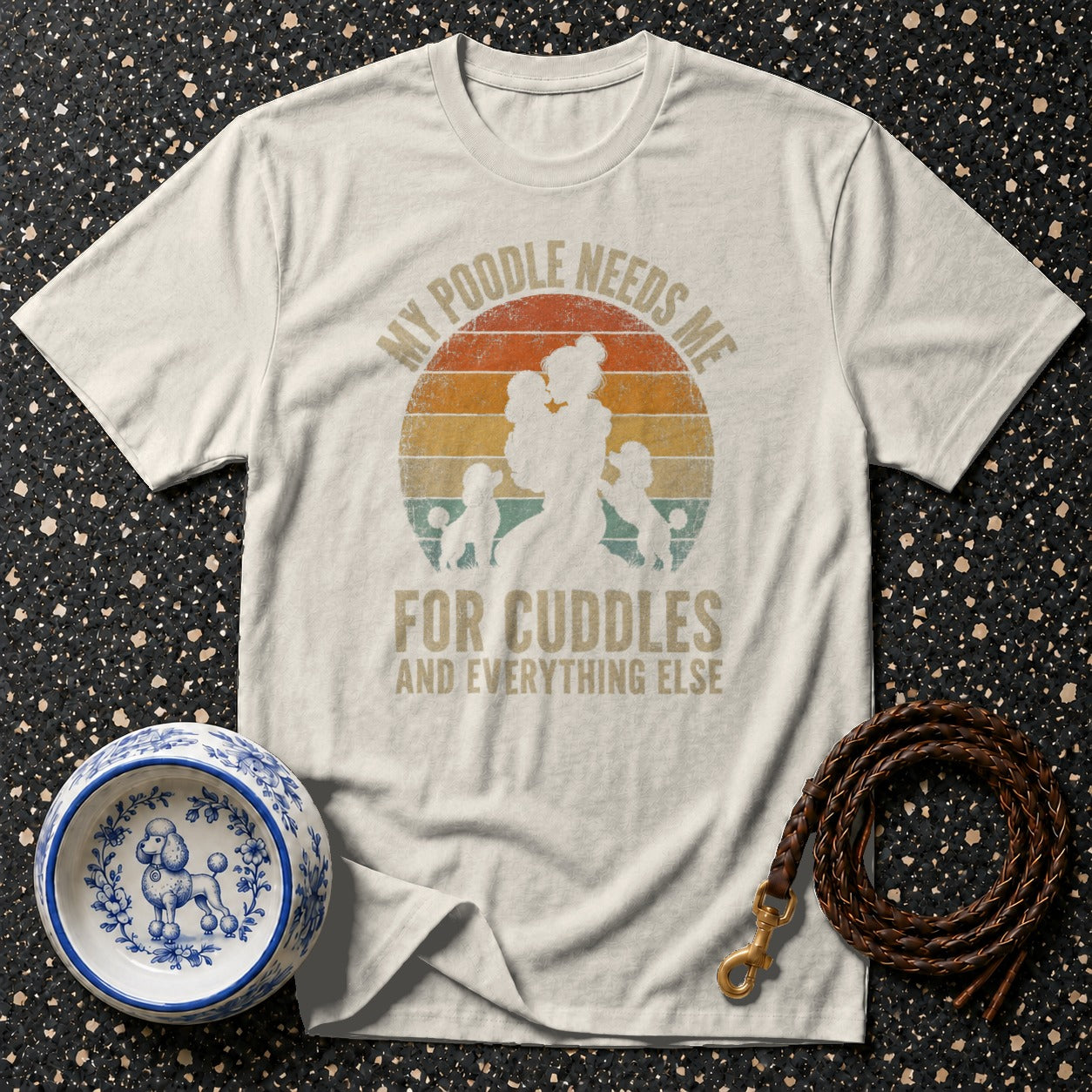 White t-shirt with "My Poodle Needs Me For Cuddles" text and dog silhouette design.