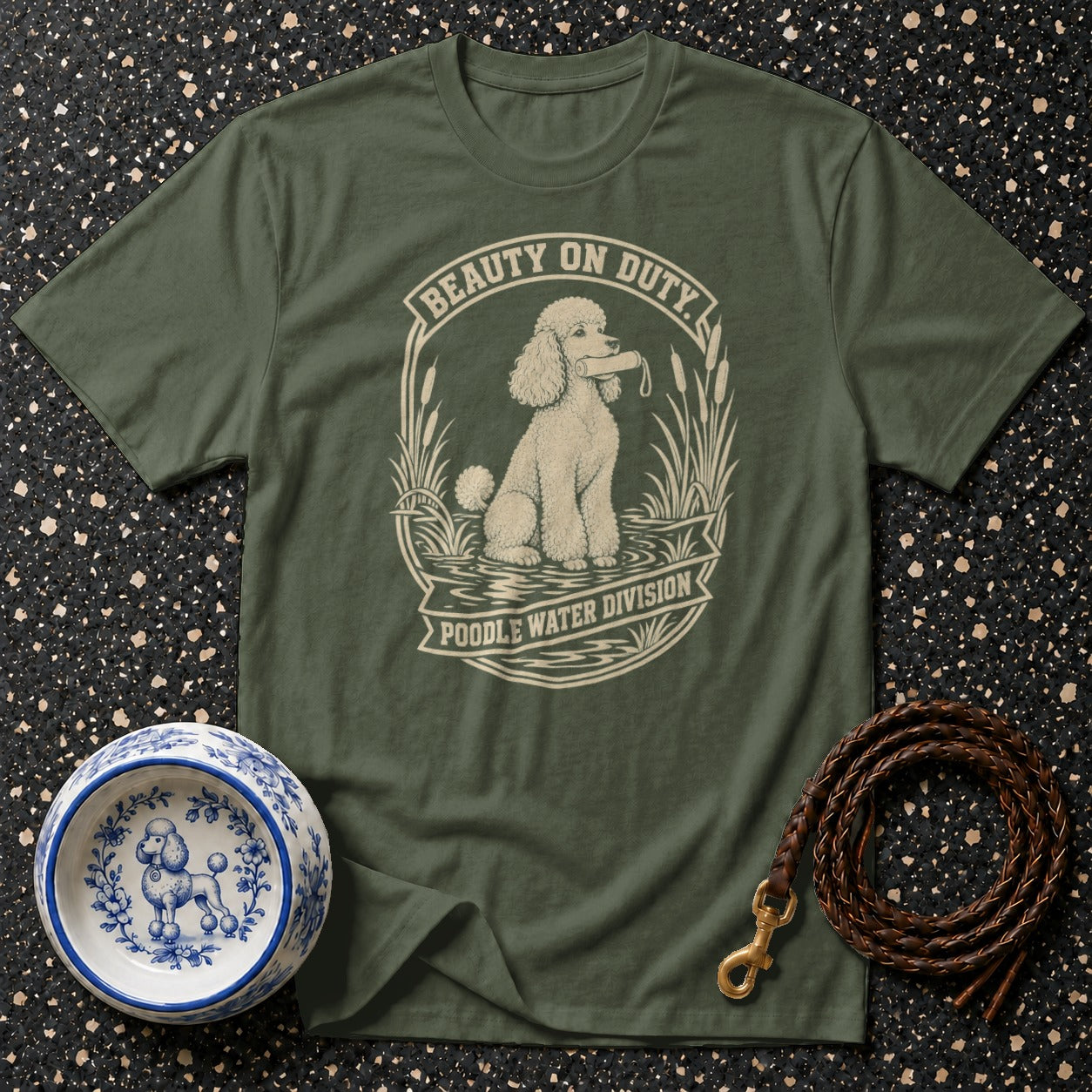 Green t-shirt with a cream poodle illustration and text "Beauty on Duty Poodle Water Division".