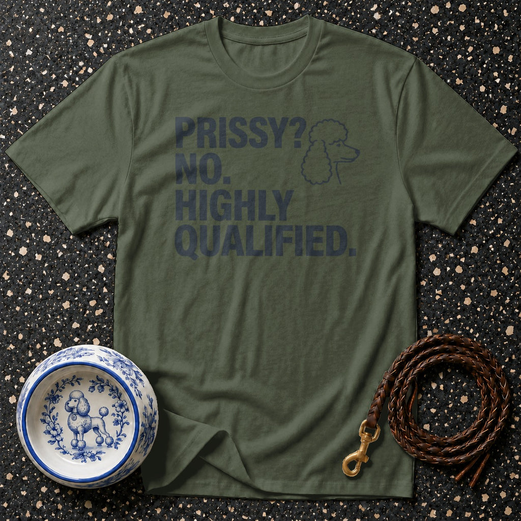 Green t-shirt with "PRISSY? NO. HIGHLY QUALIFIED." text and poodle graphic.