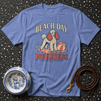 Blue t-shirt with a poodle on a beach towel and text "Beach Day Poodle Rules."