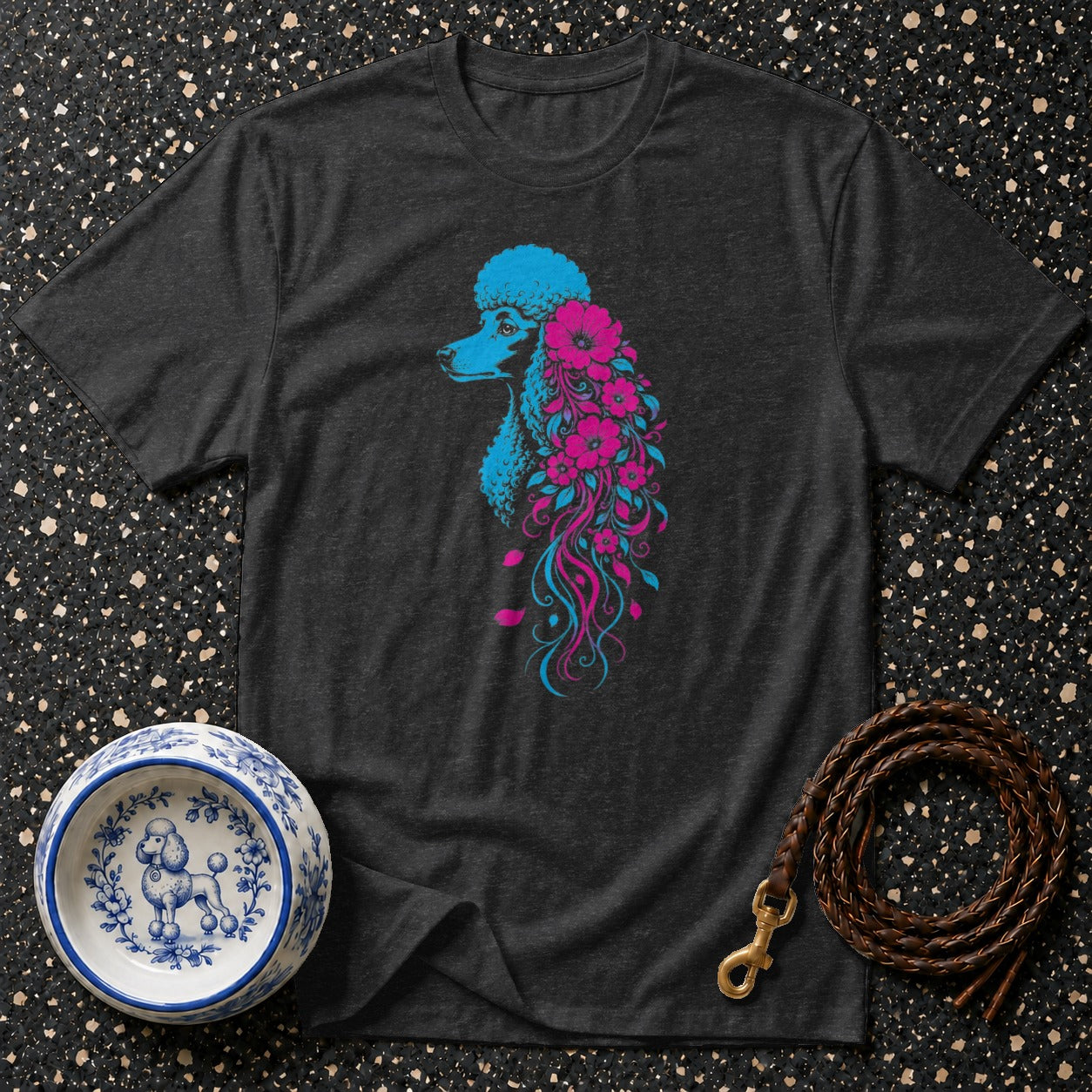 Dark t-shirt with blue and pink poodle adorned with flowers.