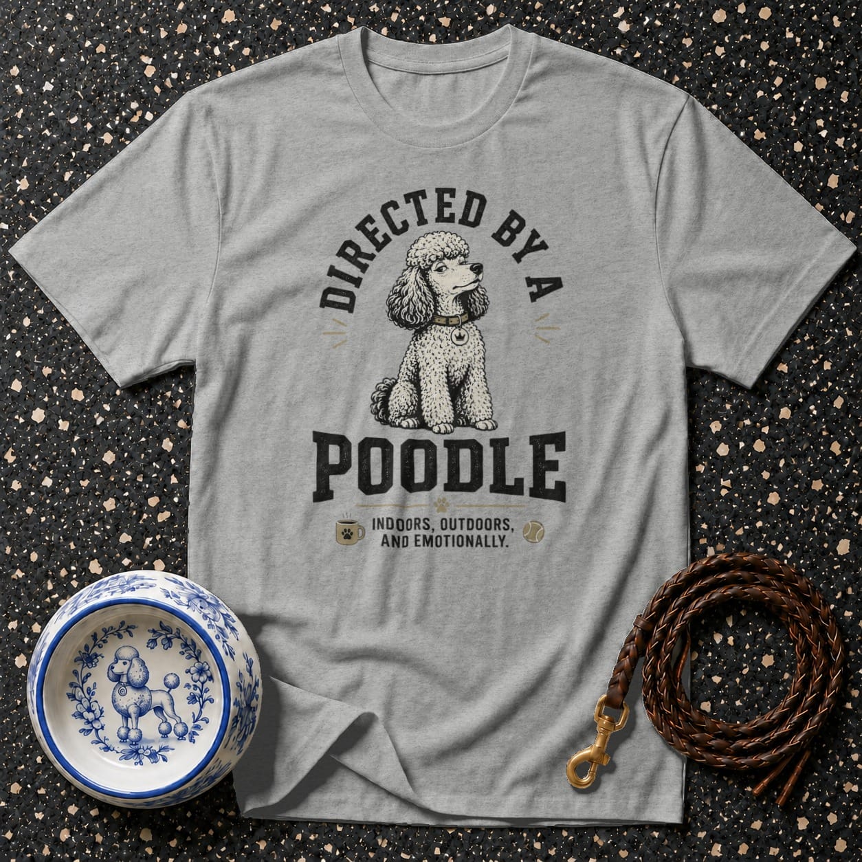 Grey t-shirt with "Directed by a poodle indoors, outdoors, and emotionally" text and poodle illustration.