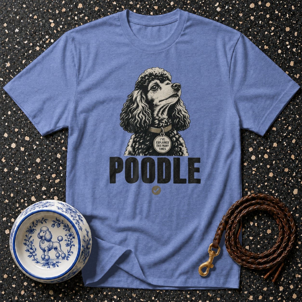 Blue t-shirt with a poodle graphic and the text "POODLE" below.