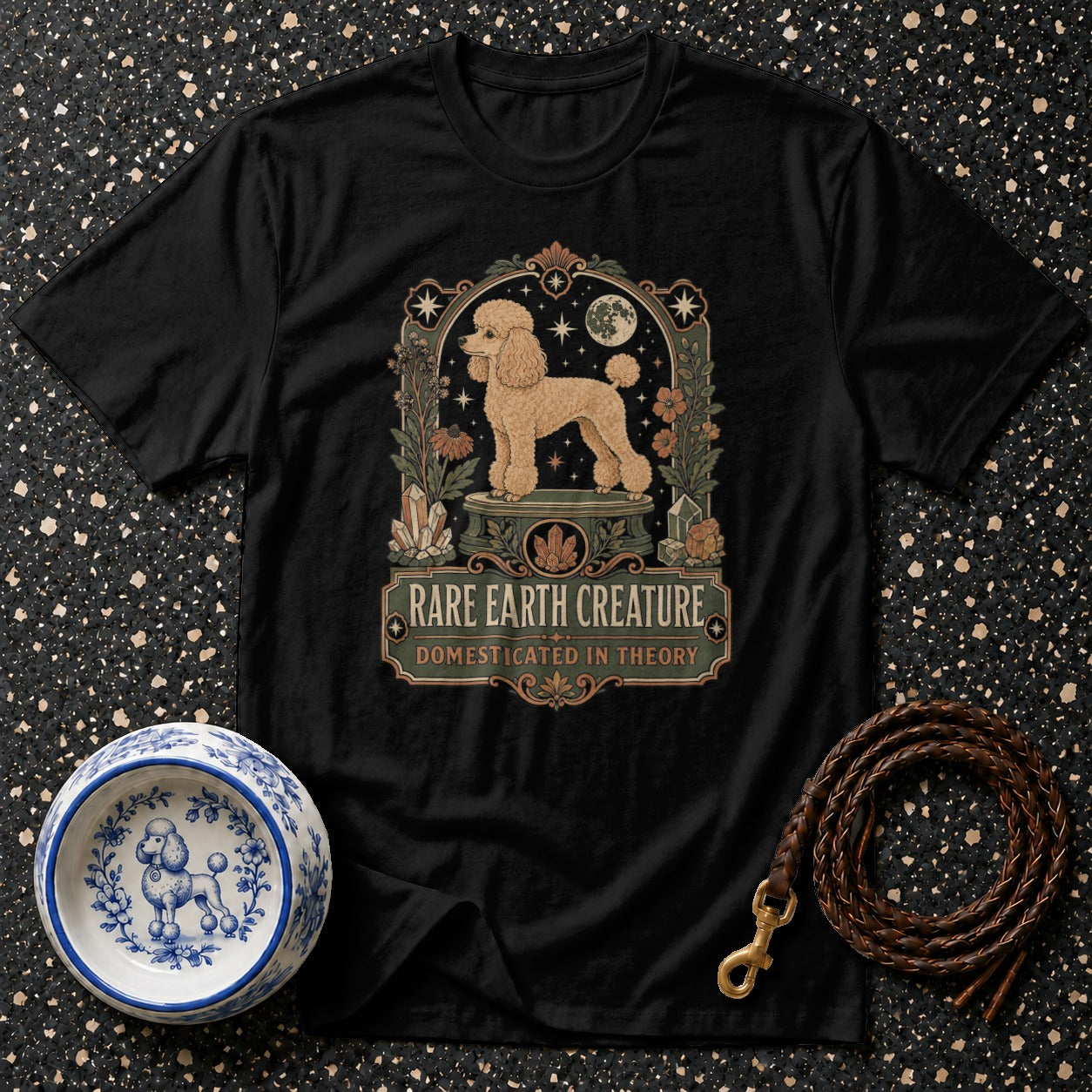 Black t-shirt with a vintage poodle graphic and text "RARE EARTH CREATURE".