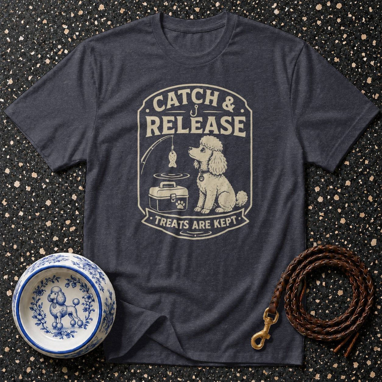 Dark grey t-shirt with "Catch & Release Treats Are Kept" graphic and a poodle.