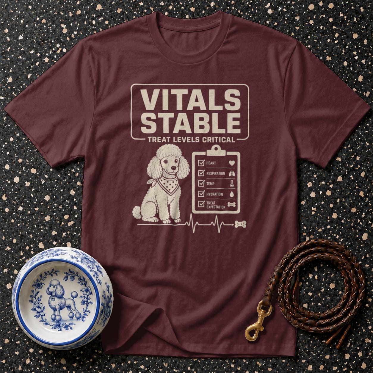 Maroon t-shirt with poodle graphic and "Vitals Stable Treat Levels Critical" text.
