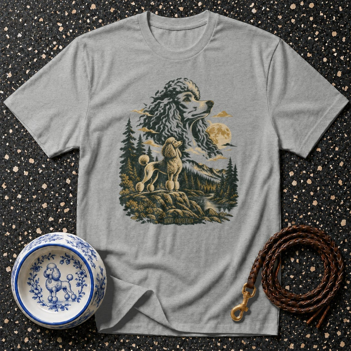 Gray t-shirt with a scenic graphic of two poodles, mountains, and trees.