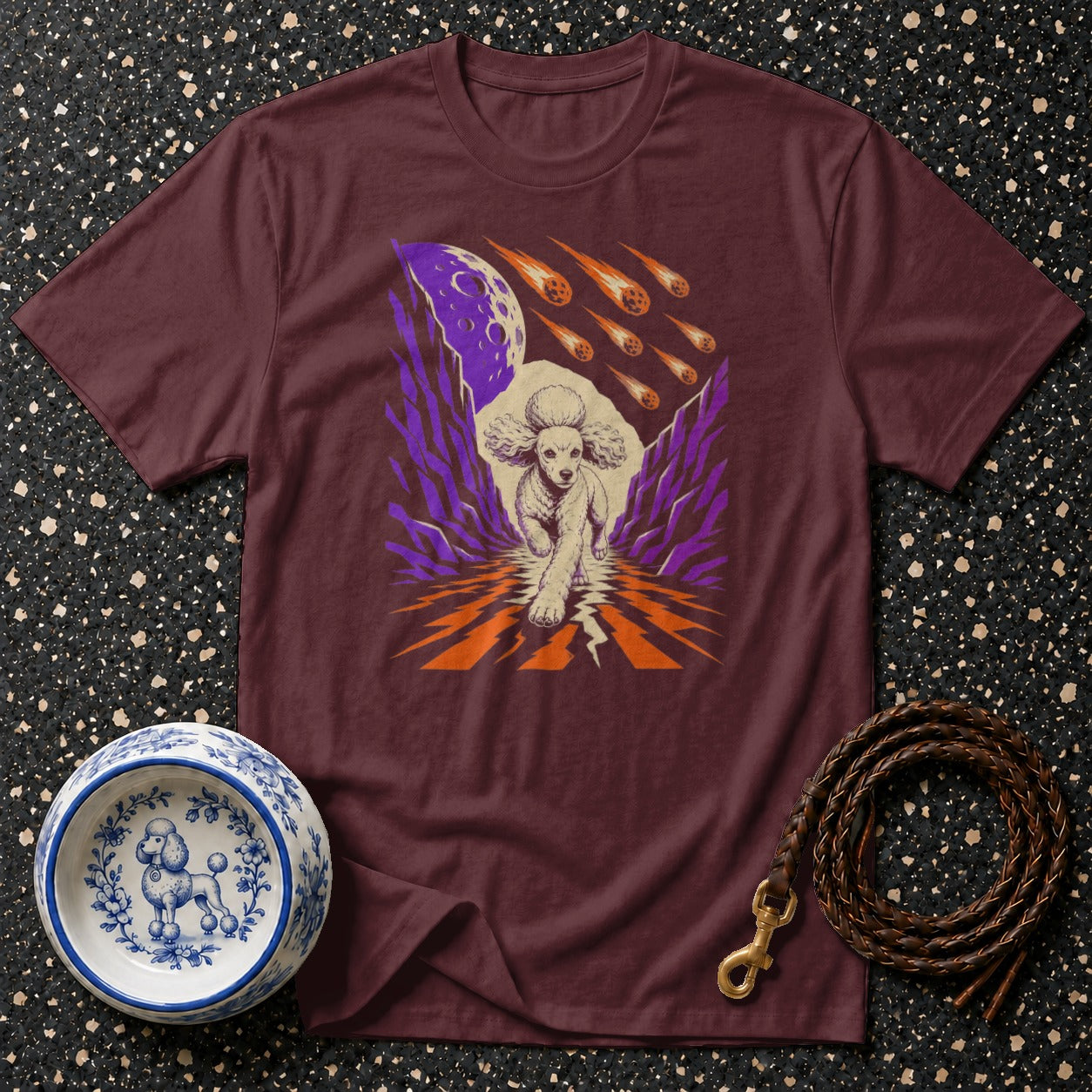 Maroon t-shirt with a poodle running through a comet shower.