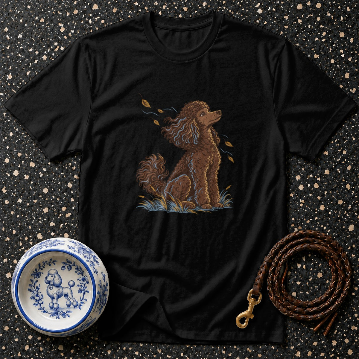 Black t-shirt with a brown poodle illustration, dog bowl, and leather leash.