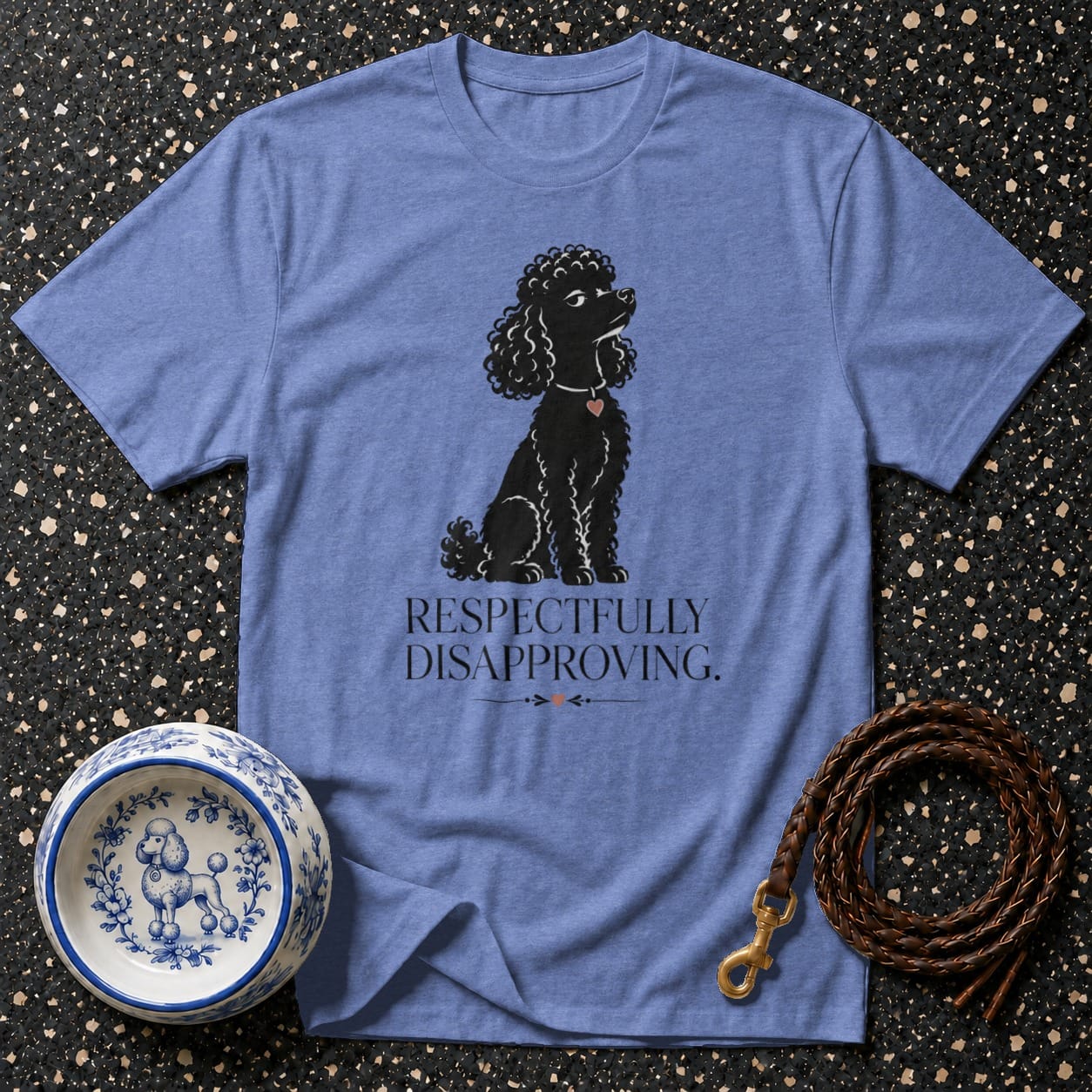 Blue t-shirt with a black poodle graphic and text that reads "RESPECTFULLY DISAPPROVING."