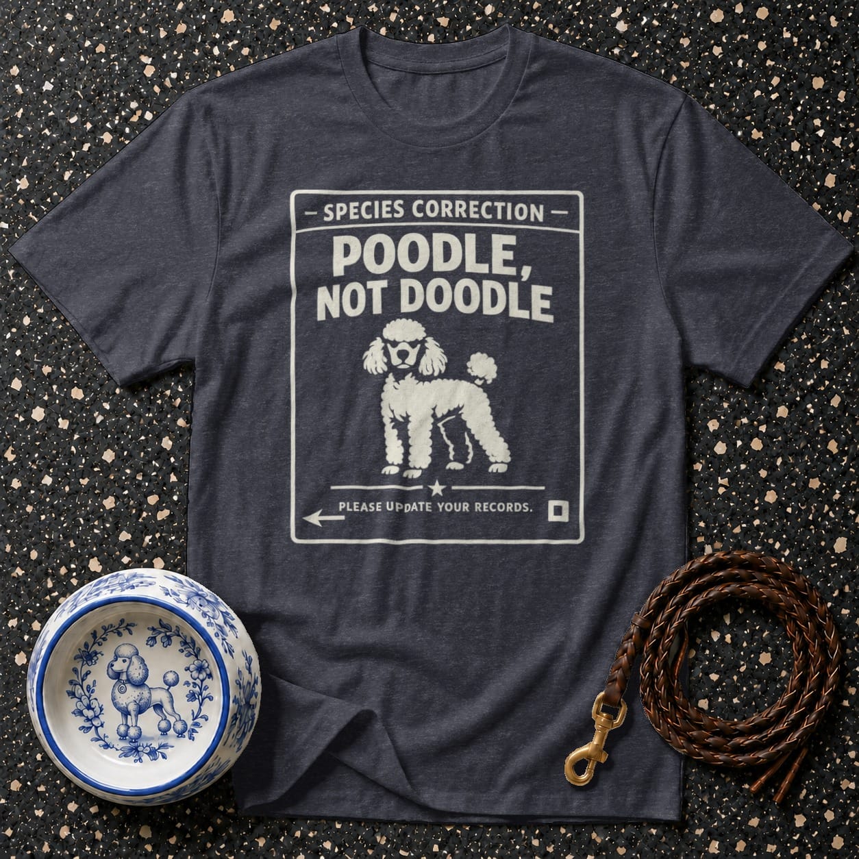 Dark t-shirt with "Poodle, Not Doodle" text and poodle illustration.