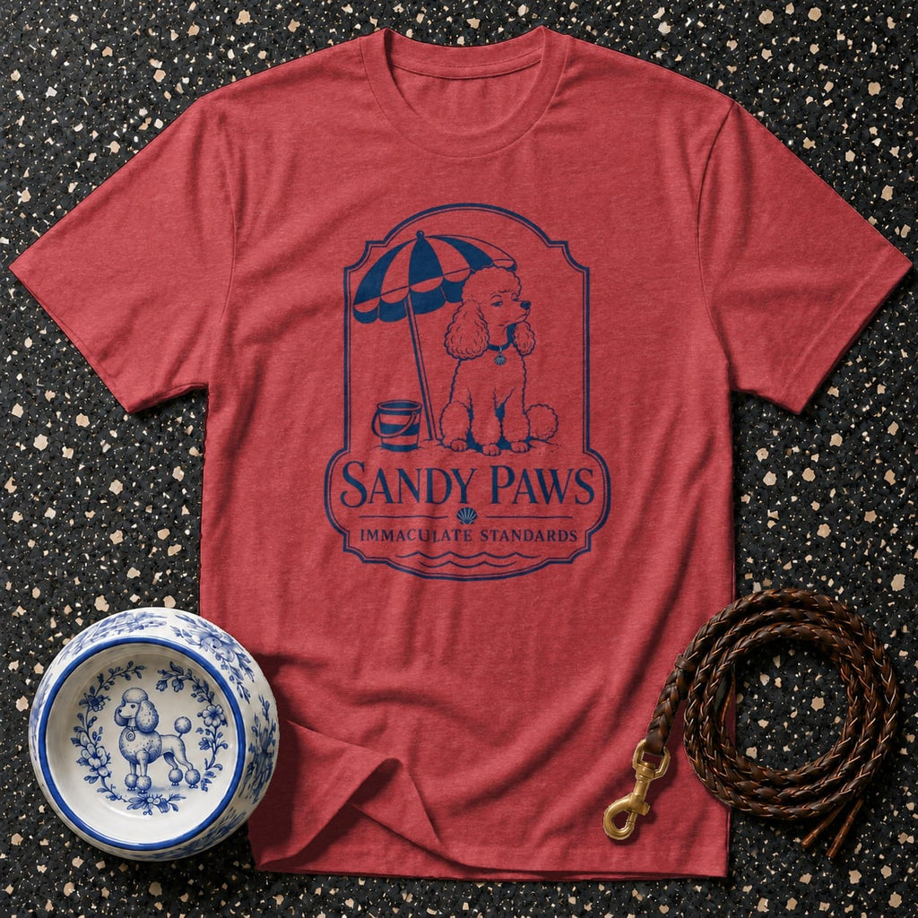 T-shirt with blue "Sandy Paws Immaculate Standards" logo featuring a poodle on the beach.