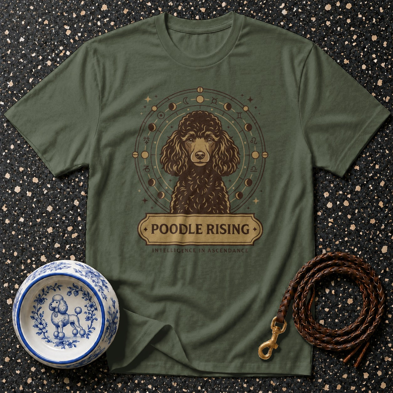 Green t-shirt featuring a poodle with astrological symbols and "POODLE RISING" text.
