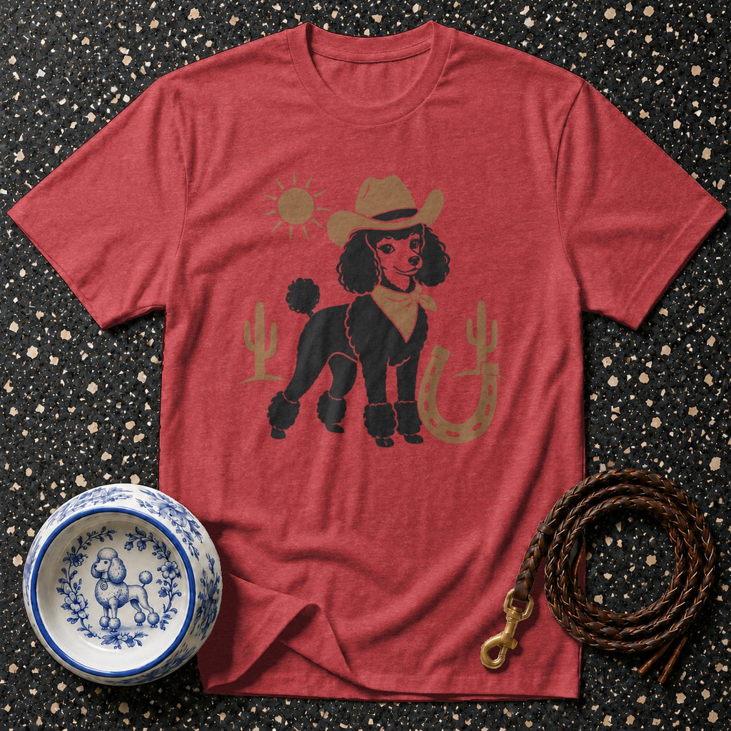 Red t-shirt with black poodle in cowboy hat and bandana, desert scene.