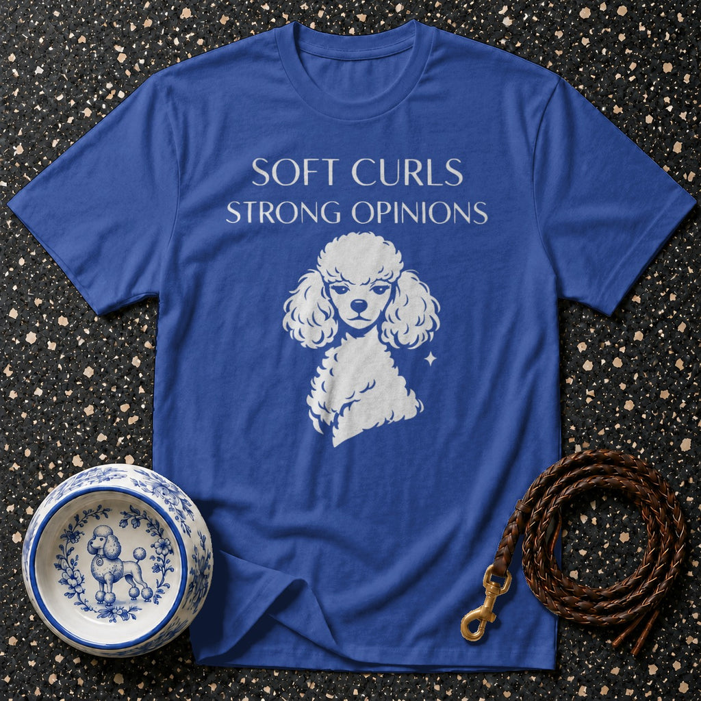 Blue t-shirt with white poodle graphic and "SOFT CURLS STRONG OPINIONS" text.