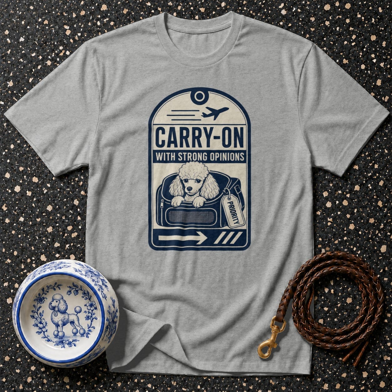 Gray t-shirt with "Carry-On With Strong Opinions" and a poodle in a carrier design.