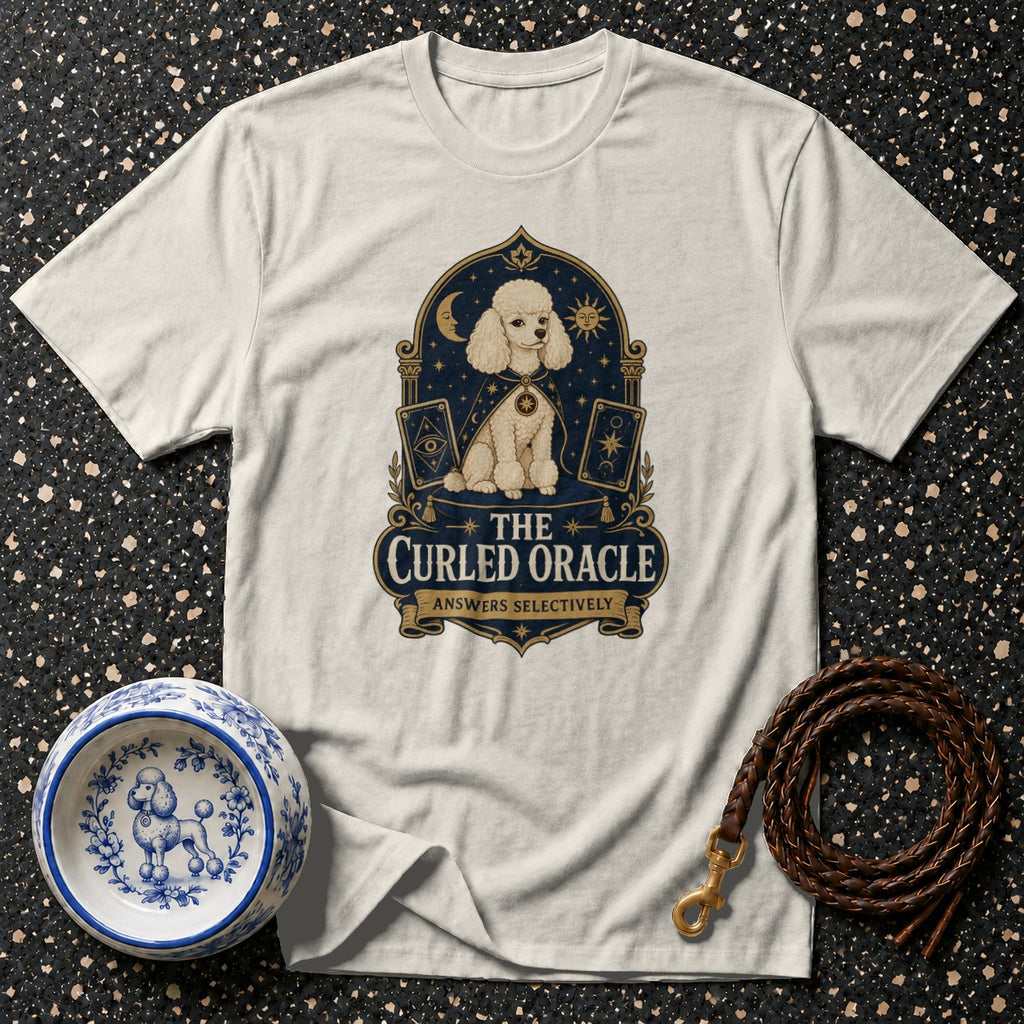White t-shirt with a poodle oracle graphic that says "THE CURLED ORACLE ANSWERS SELECTIVELY".