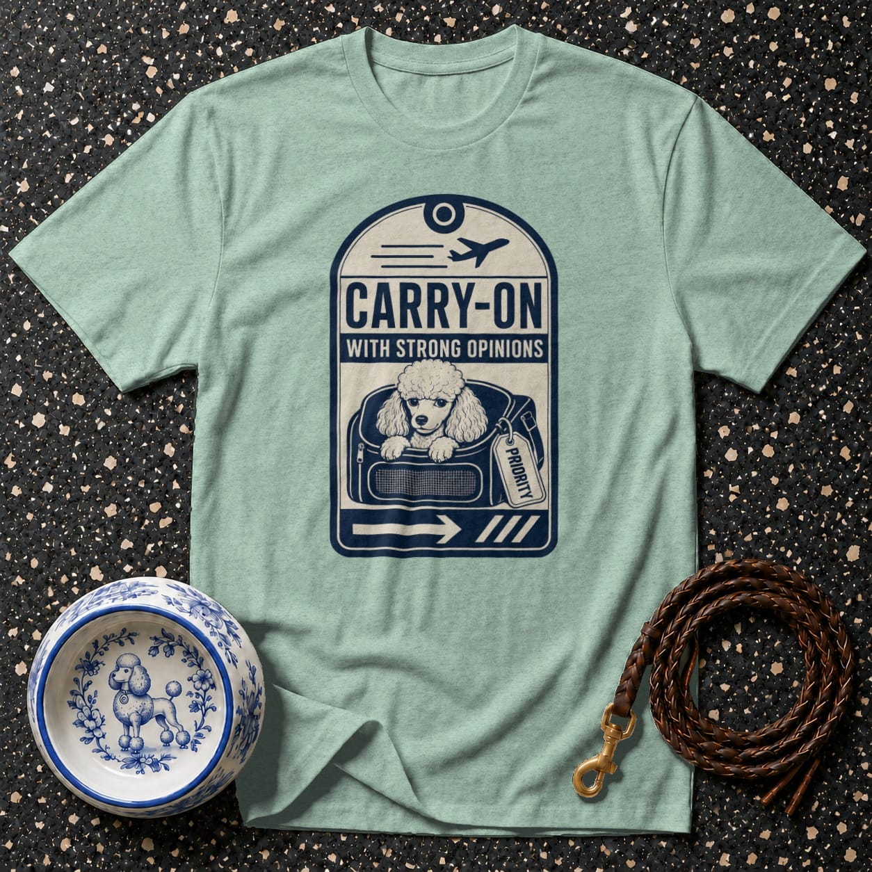 Light blue t-shirt with "Carry-On With Strong Opinions" poodle graphic