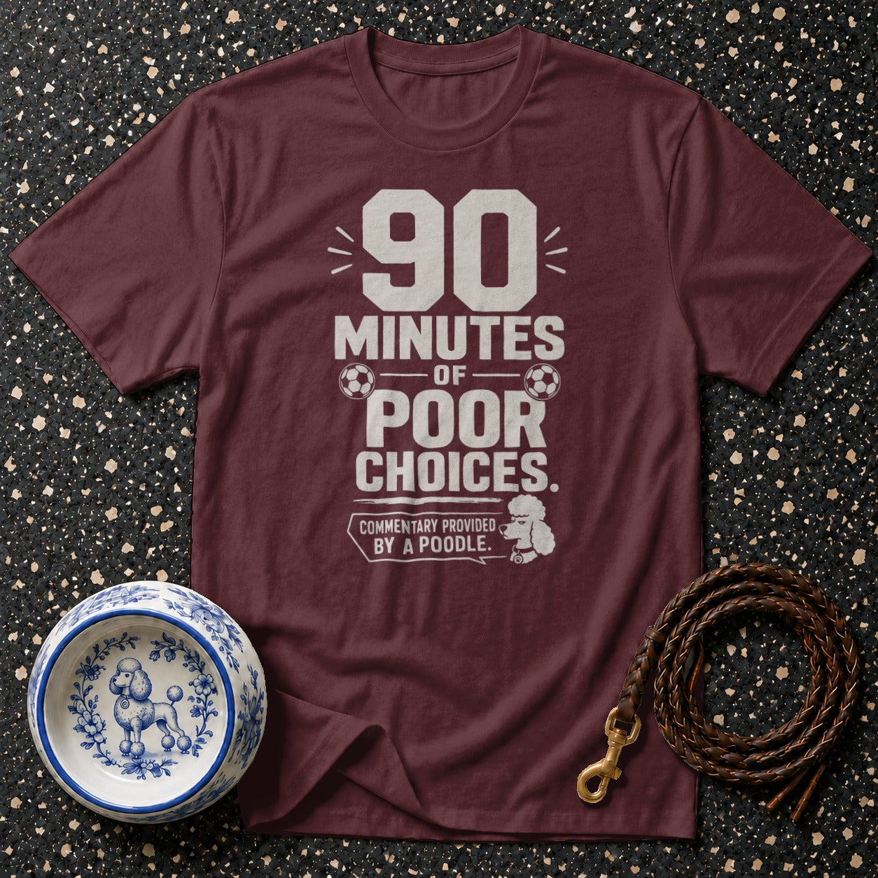 Maroon t-shirt with "90 minutes of poor choices. Commentary provided by a poodle." text.