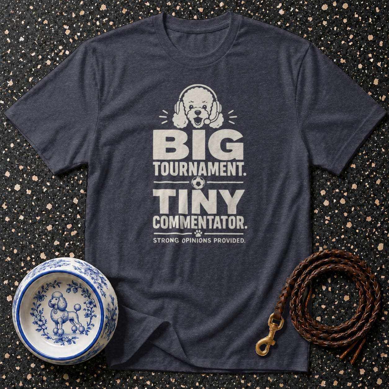 Dark heather t-shirt with "Big Tournament. Tiny Commentator." dog graphic.
