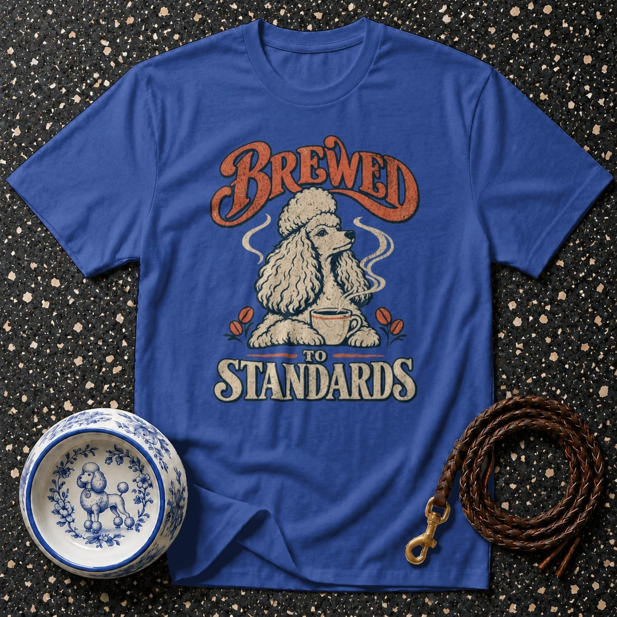Blue t-shirt with "Brewed to Standards" text and poodle drinking coffee.