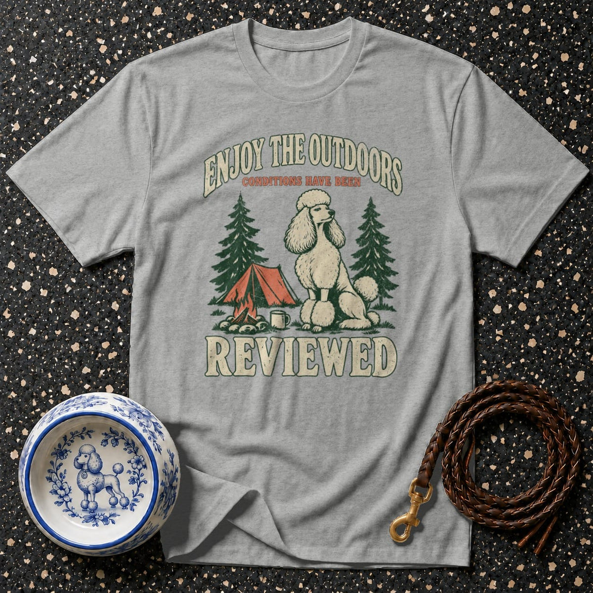 Gray t-shirt with "Enjoy the Outdoors Reviewed" text and poodle camping graphic.