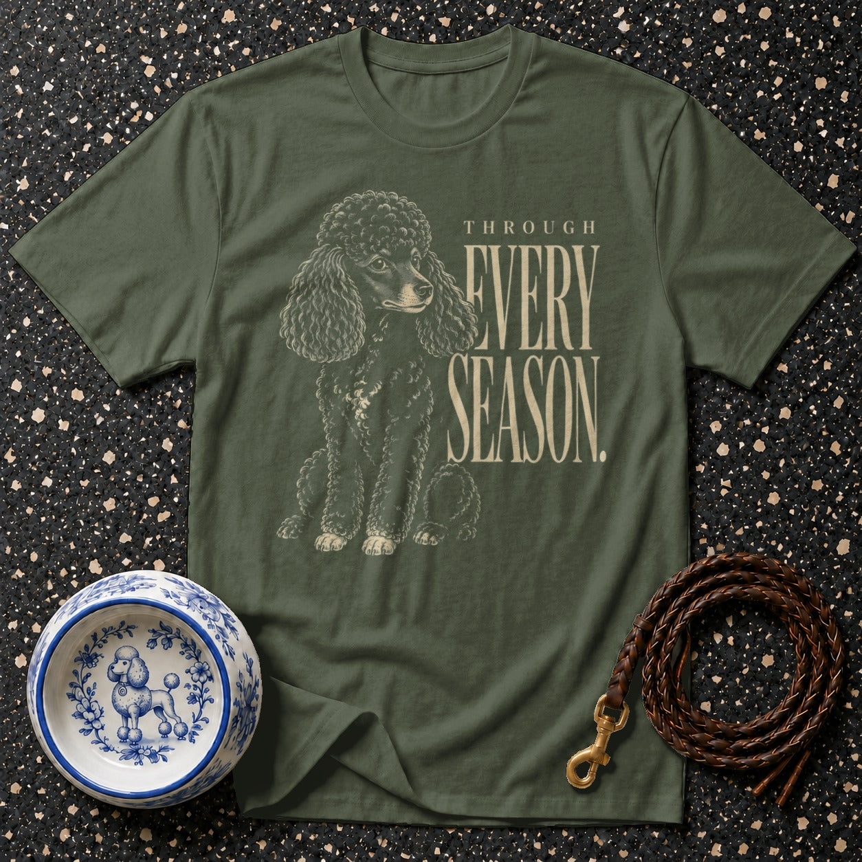 Green t-shirt with a vintage poodle illustration and text "THROUGH EVERY SEASON."