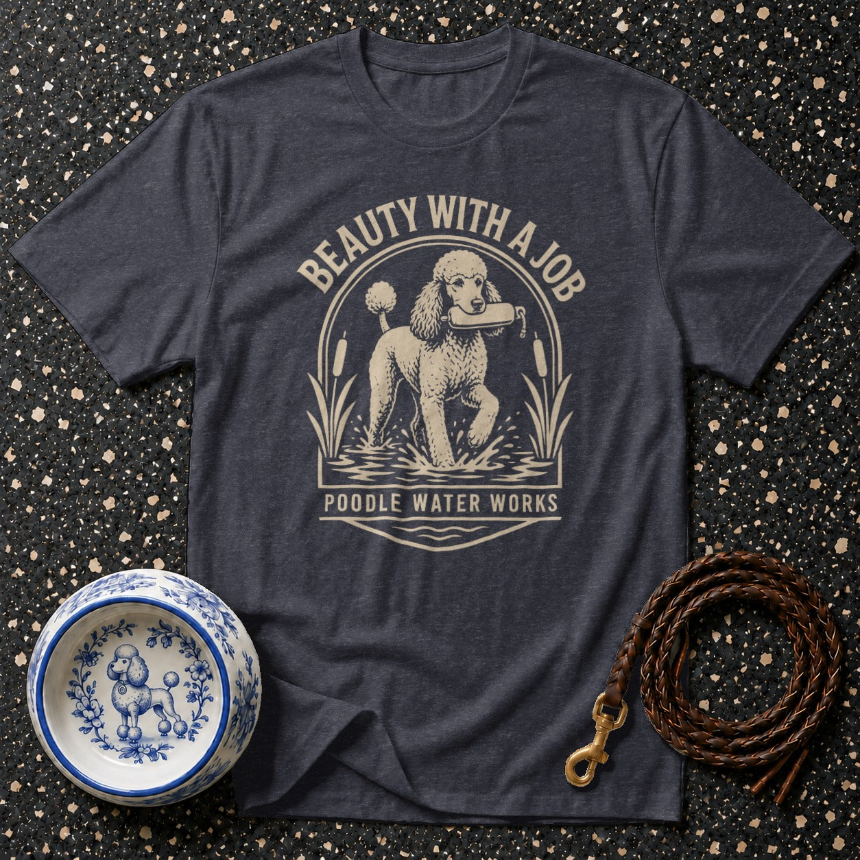 Dark t-shirt with a poodle design and text "Beauty with a Job Poodle Water Works".