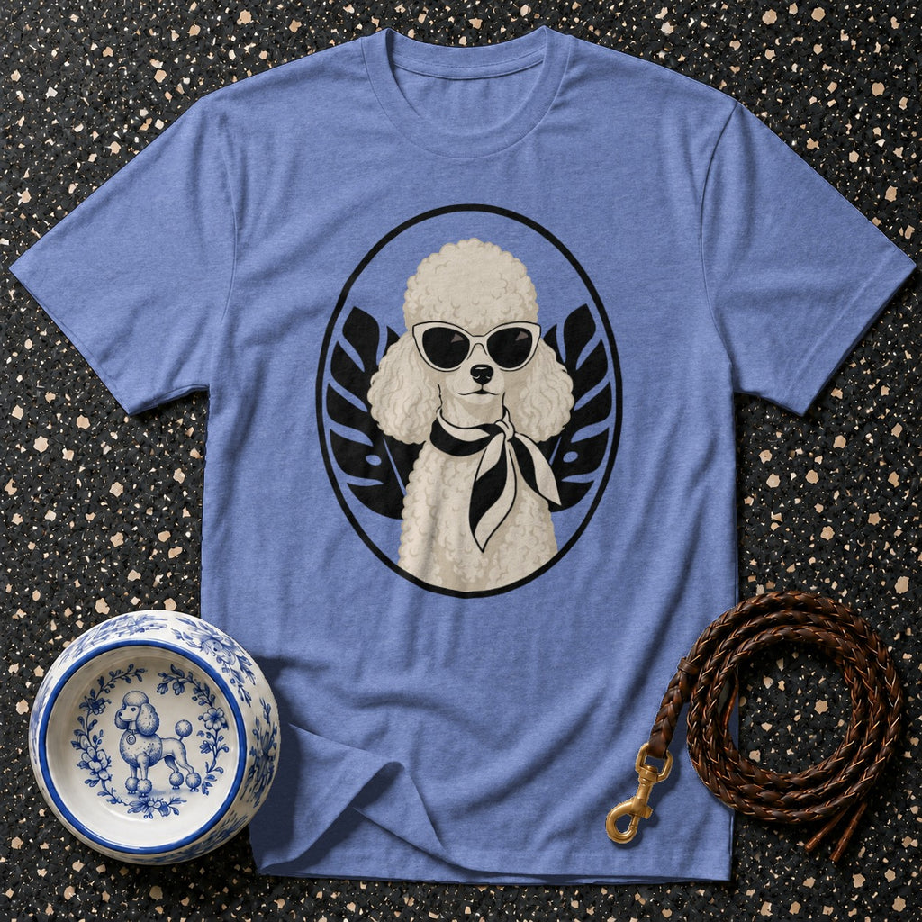 Blue t-shirt featuring a poodle wearing sunglasses and a scarf in a circular graphic.