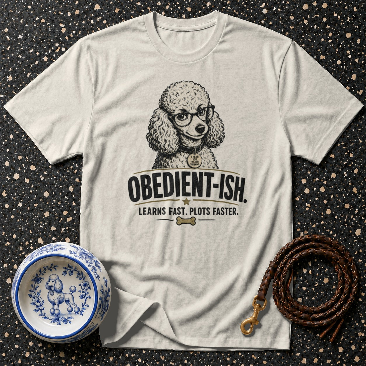 Cream t-shirt with a poodle wearing glasses and "OBEDIENT-ISH" text.
