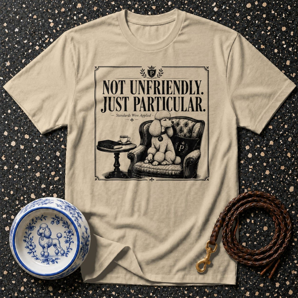 T-shirt with "Not Unfriendly. Just Particular." and poodle in armchair graphic.