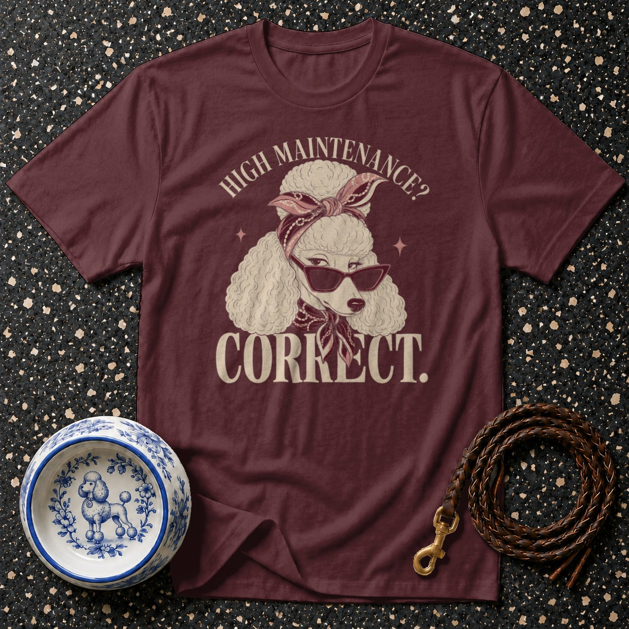 Burgundy t-shirt with poodle graphic that reads "High Maintenance? Correct."