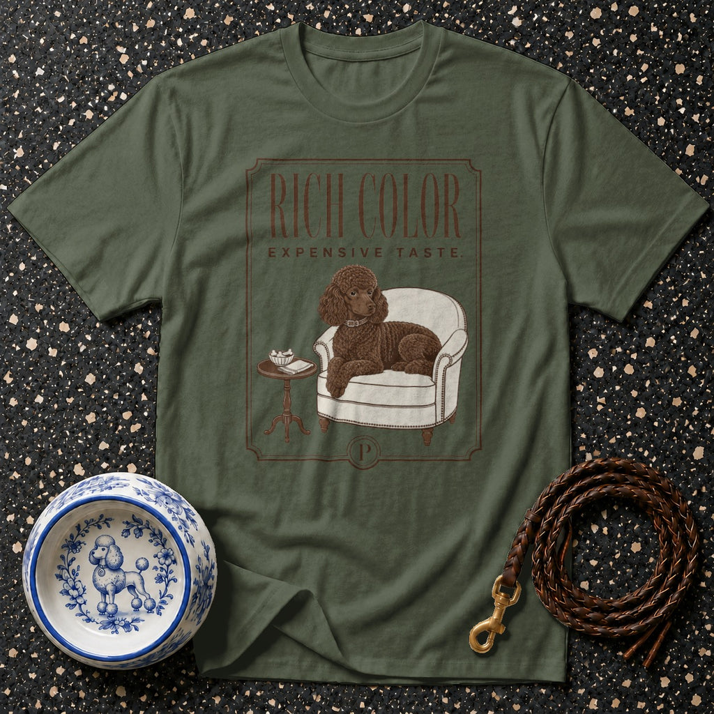 Green t-shirt with graphic of poodle in armchair, "RICH COLOR EXPENSIVE TASTE" text.