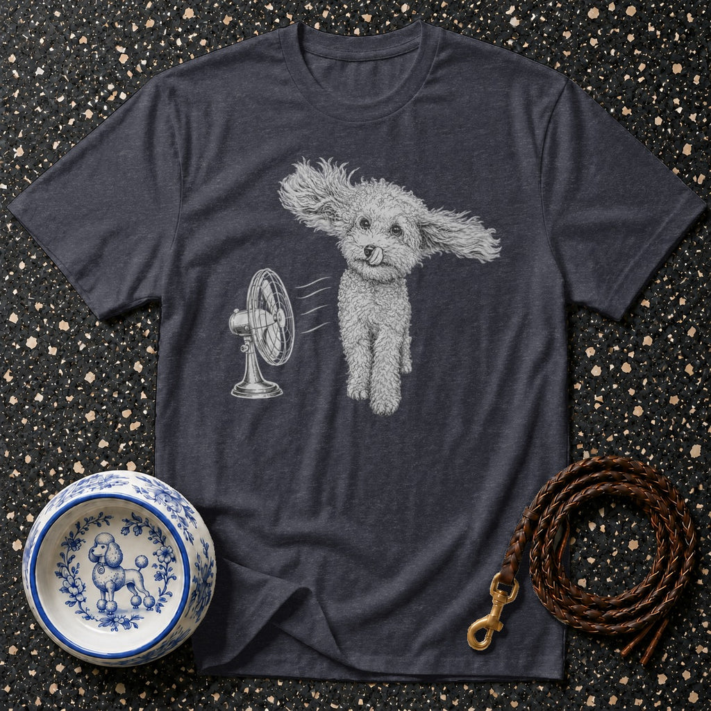 T-shirt with a drawing of a fluffy dog with ears blowing in the wind from a fan.
