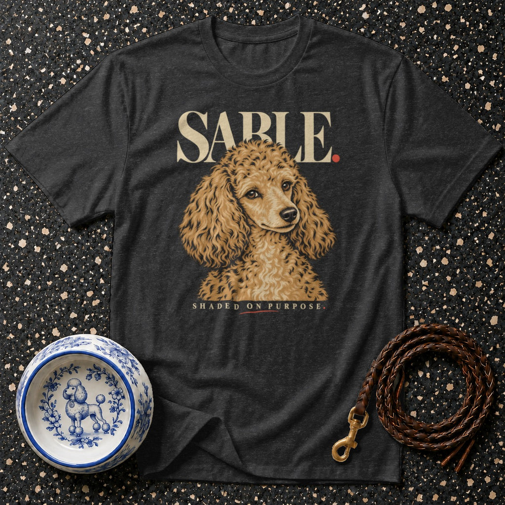 Dark t-shirt with a poodle illustration and text "SABLE SHADED ON PURPOSE."