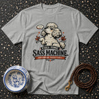 Grey t-shirt with a poodle graphic and the text "FULL-TIME SASS MACHINE. LOUD OPINIONS. PERFECT CURLS."