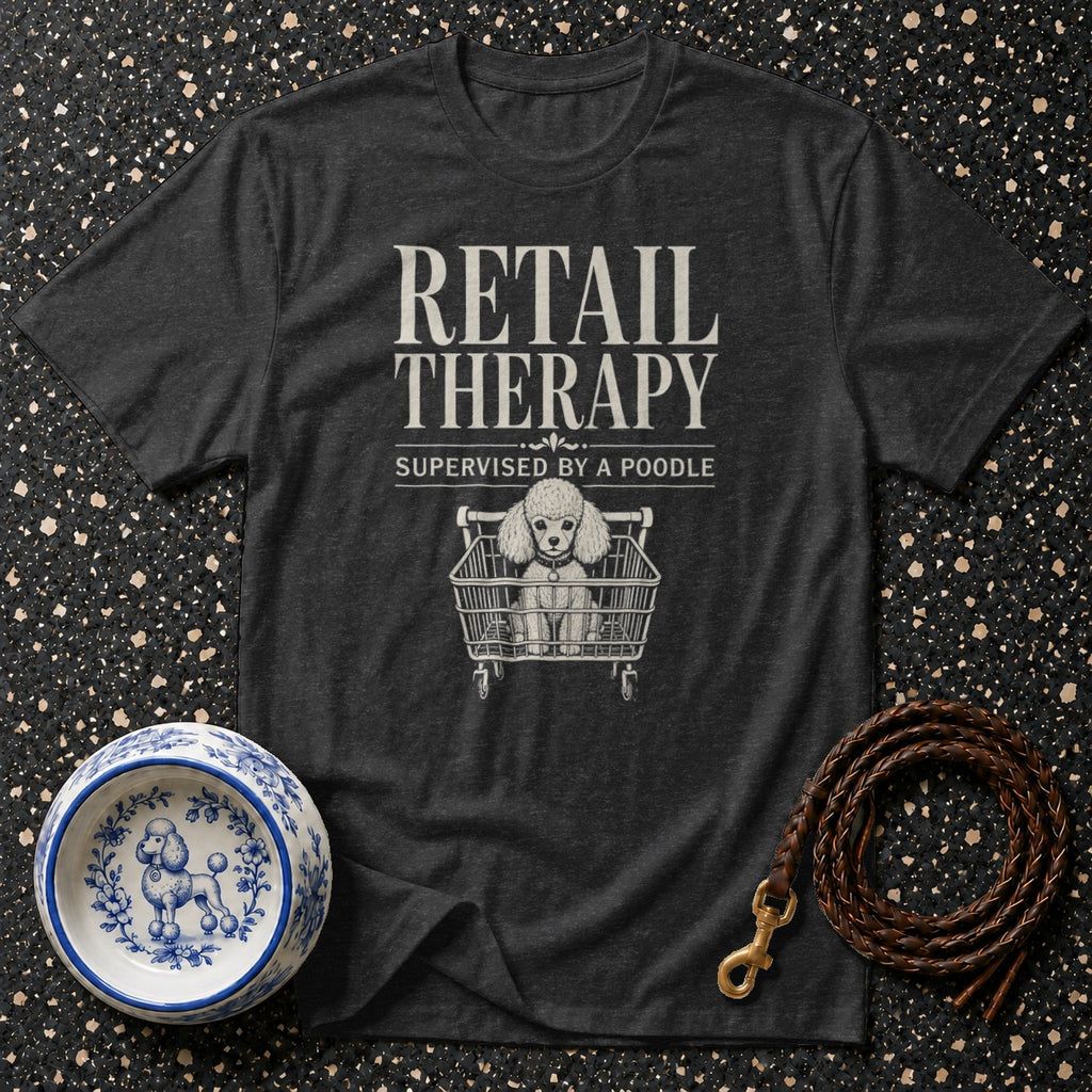 Dark grey t-shirt with "Retail Therapy Supervised by a Poodle" text and poodle in shopping cart graphic.