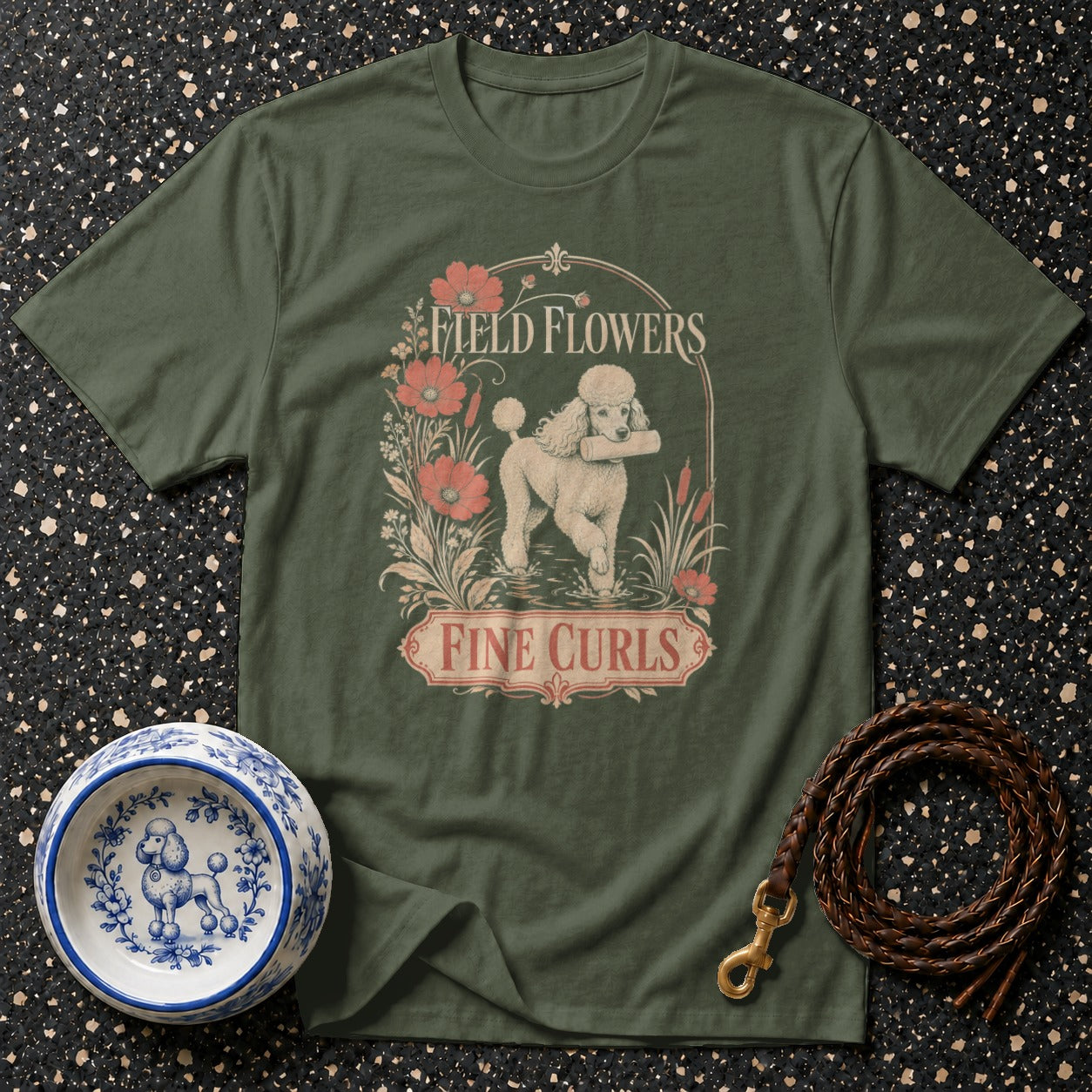 Green t-shirt with "Field Flowers Fine Curls" text and a poodle illustration.