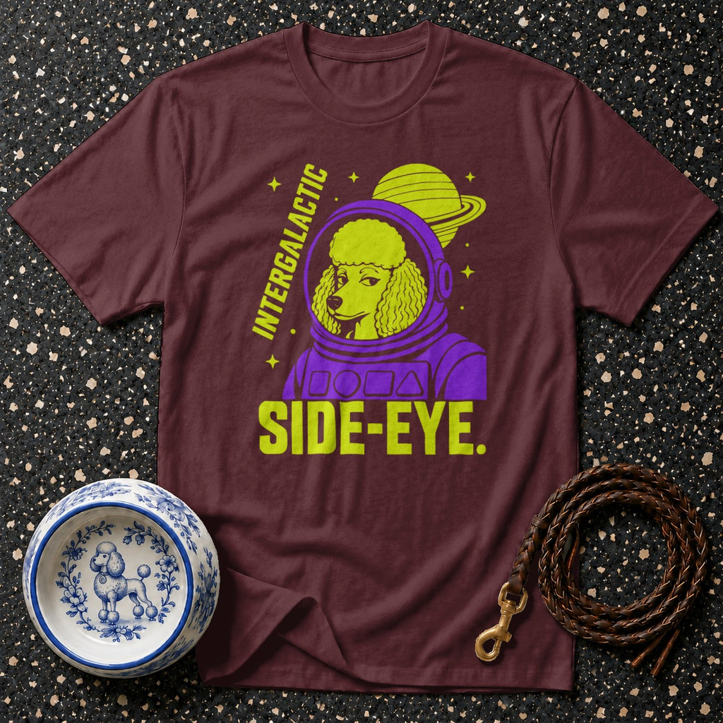 Maroon t-shirt with poodle astronaut graphic and "INTERGALACTIC SIDE-EYE" text.