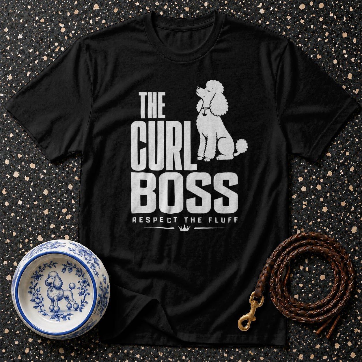 Black t-shirt with white text "The Curl Boss Respect The Fluff" and poodle graphic.